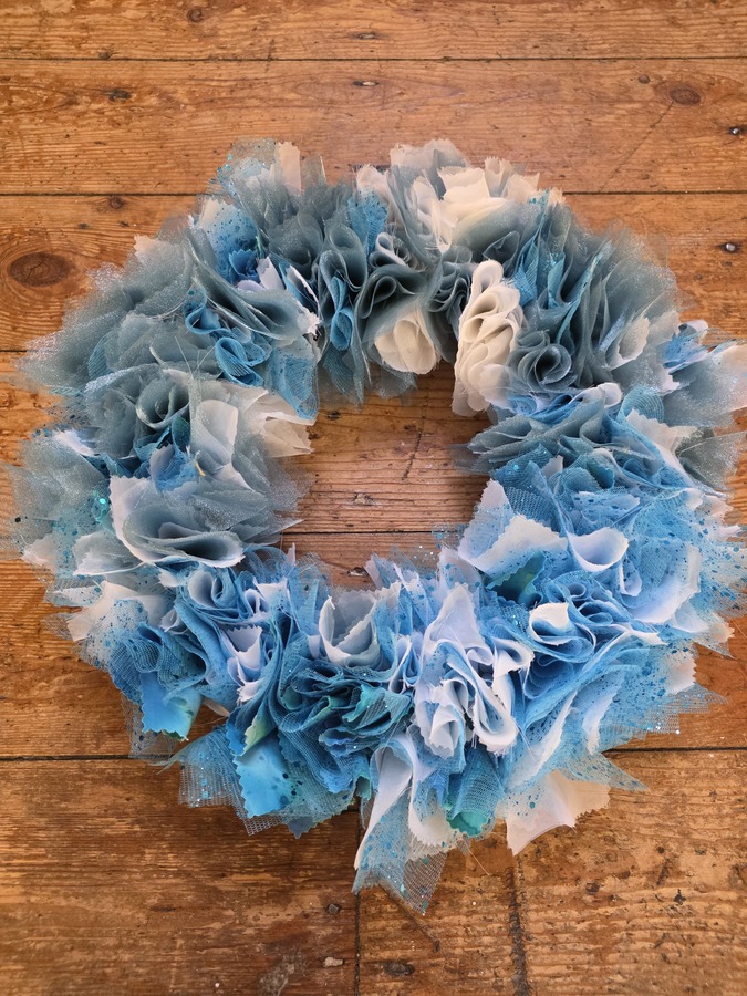 Dexi- fabric wreath made on a template created by her husband